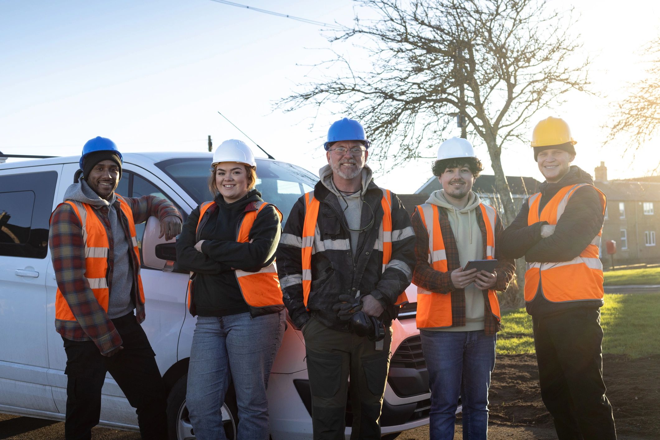 Property maintenance team standing together on site