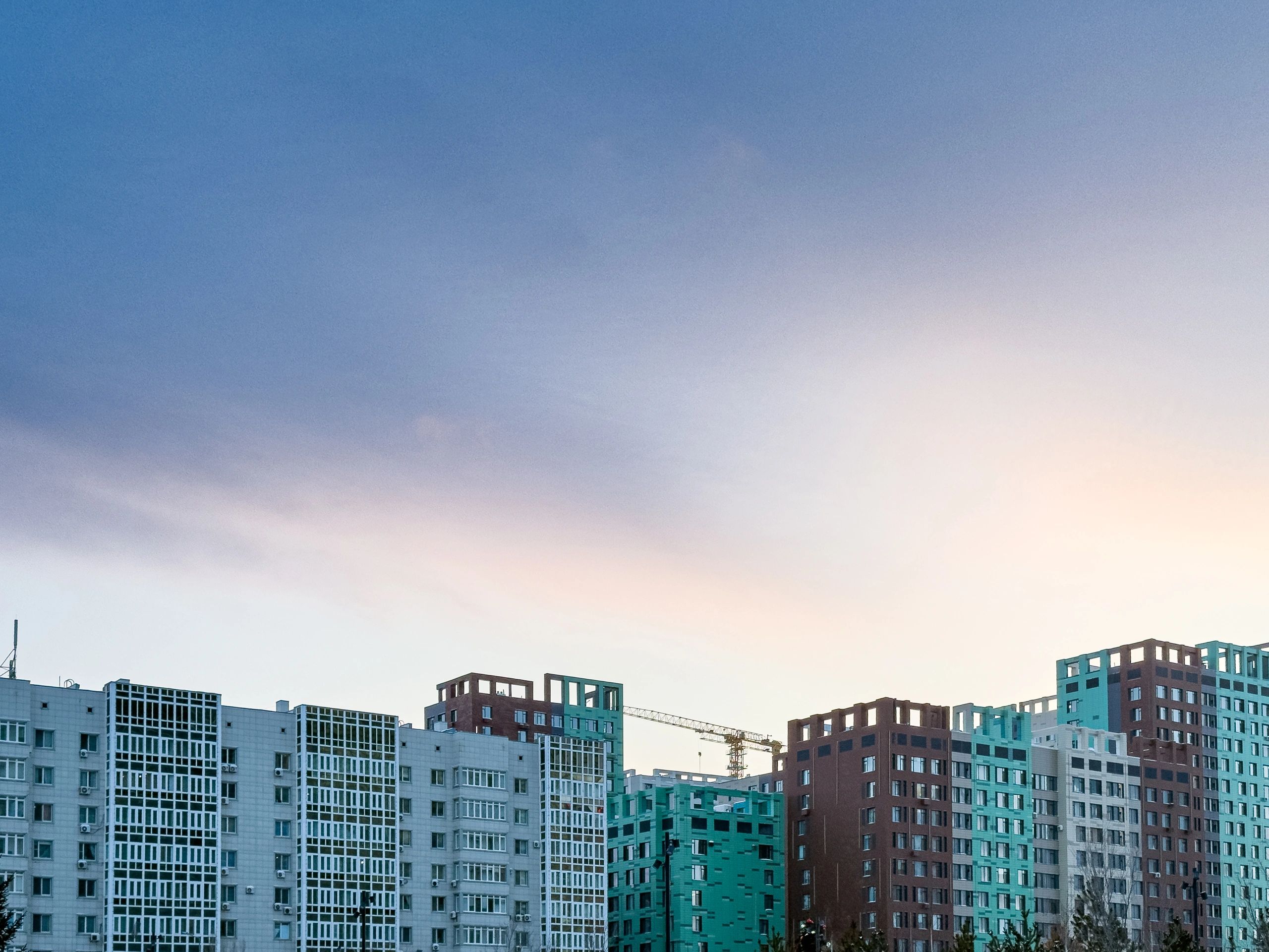 Modern apartment buildings representing HOA community exterior painting work